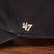 The wearer's left side of the dodgers pink bottom dad hat has the logo of 47 Brand.