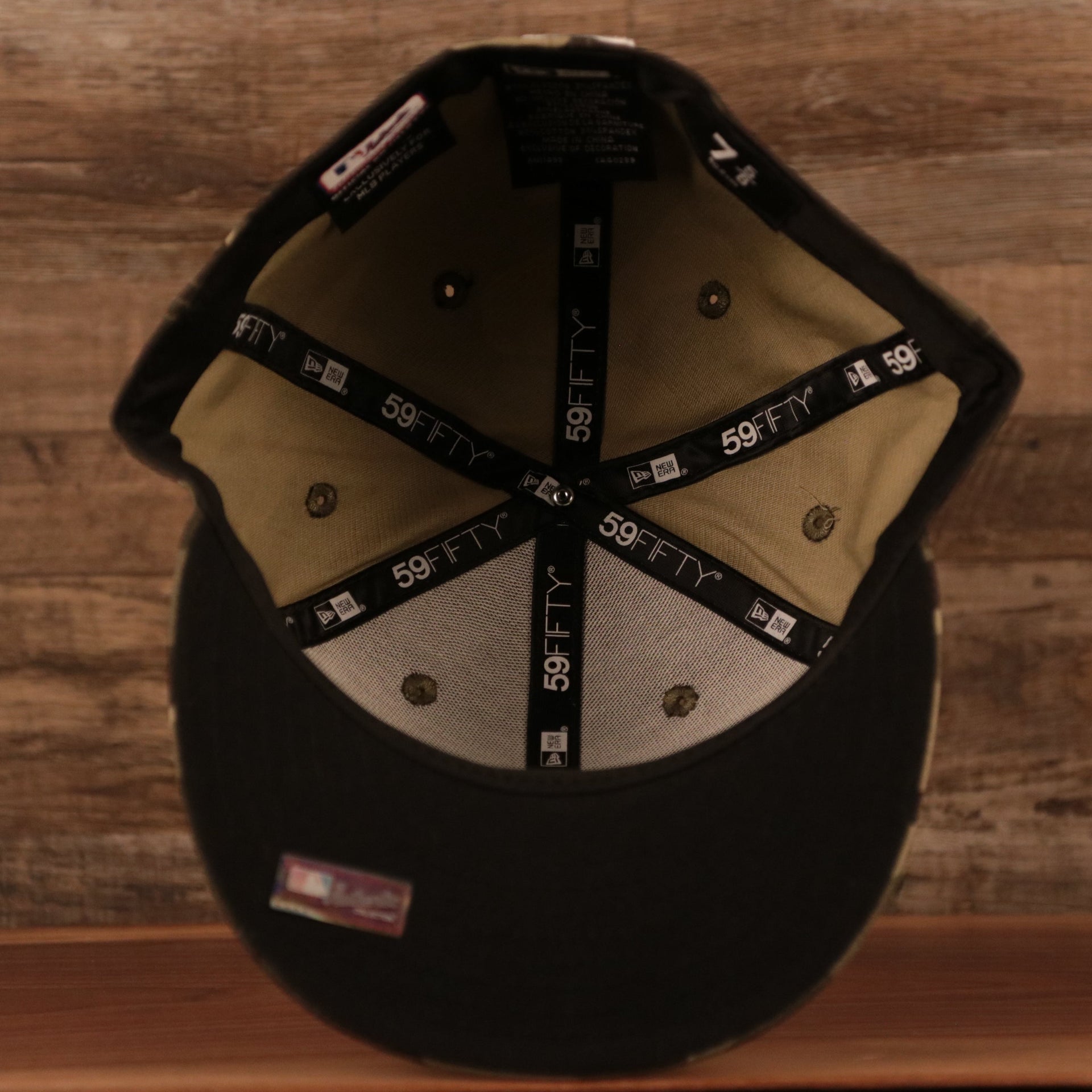 The inside view of the crown of the black bottom fitted 2021 Yankees military hat by New Era.