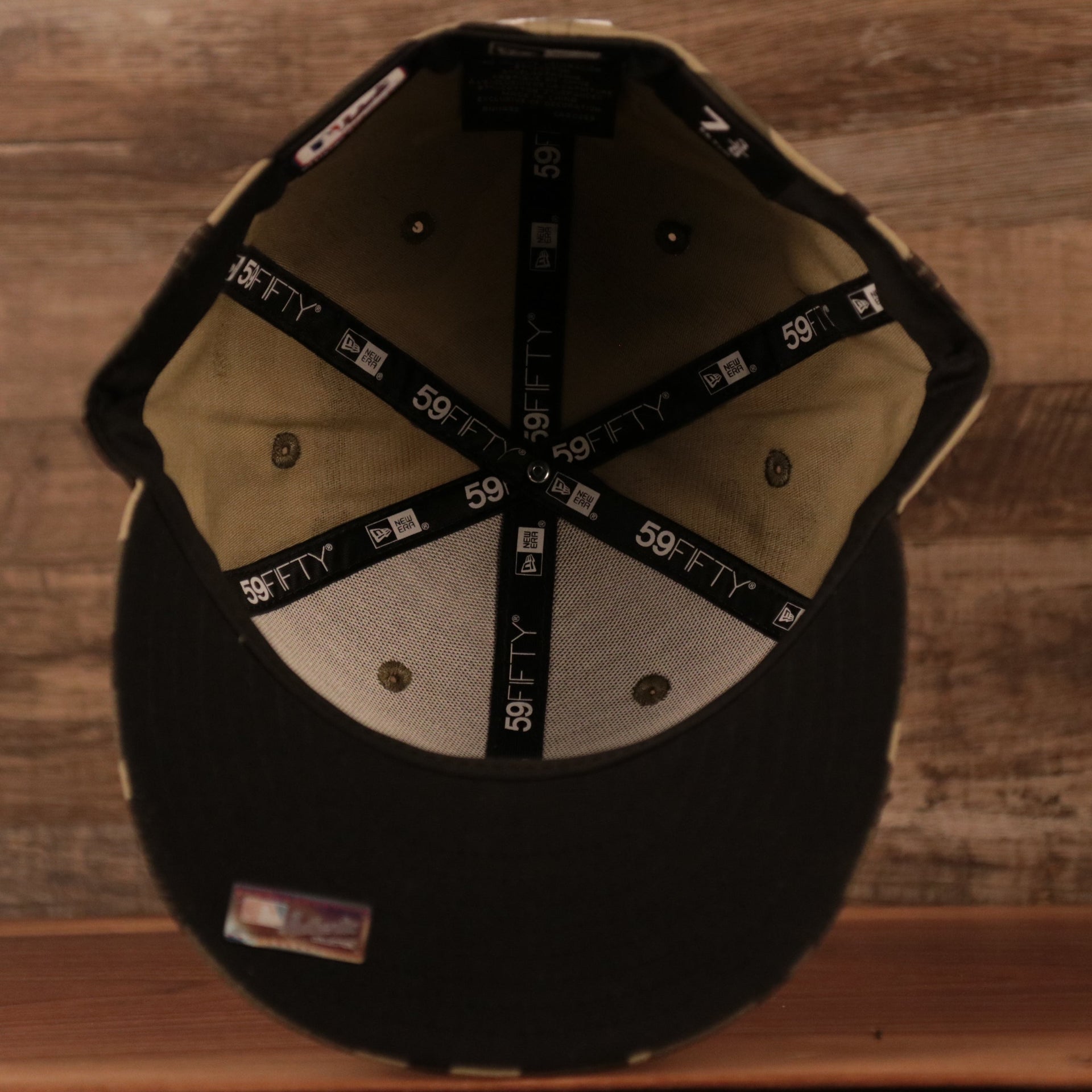 The black bottom fitted Philadelphia Phillies Memorial Day On Field Hat.