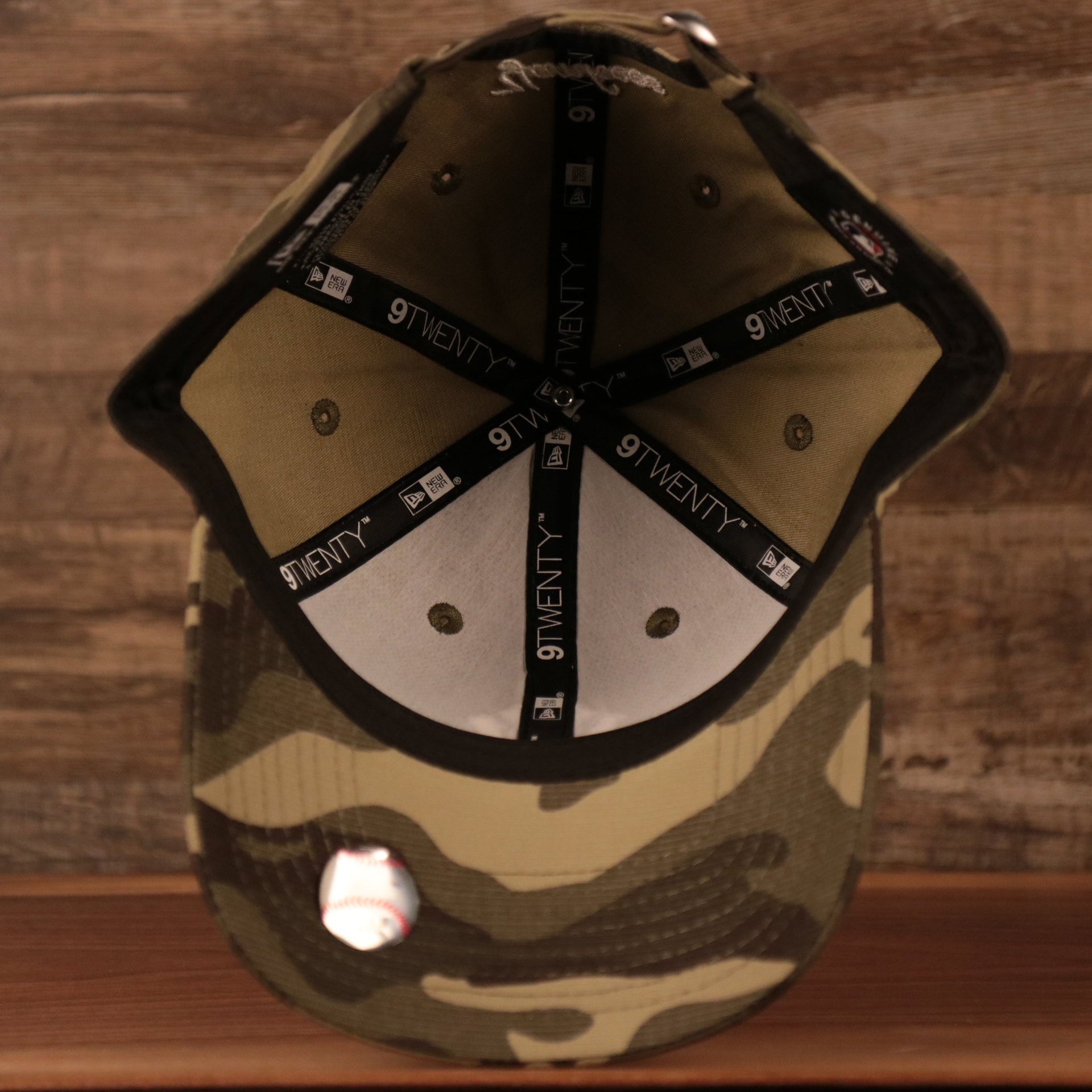 An inside look of the 2021 Armed Forces Day woodland camo bottom 920 dad hat for the New York Yankees.