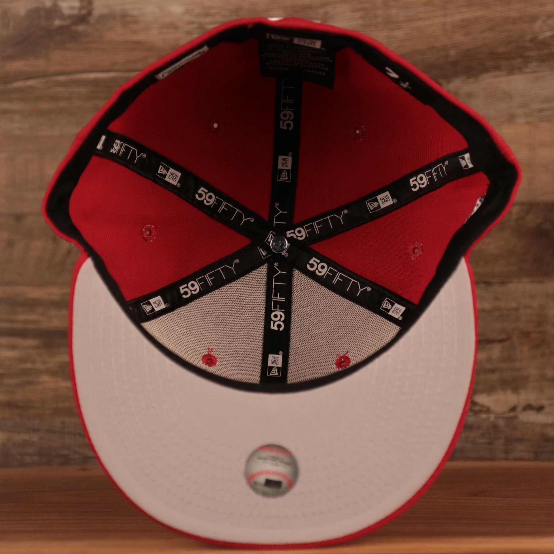 The inside of the Philadelphia Phillies gray under brim fitted 59fifty.