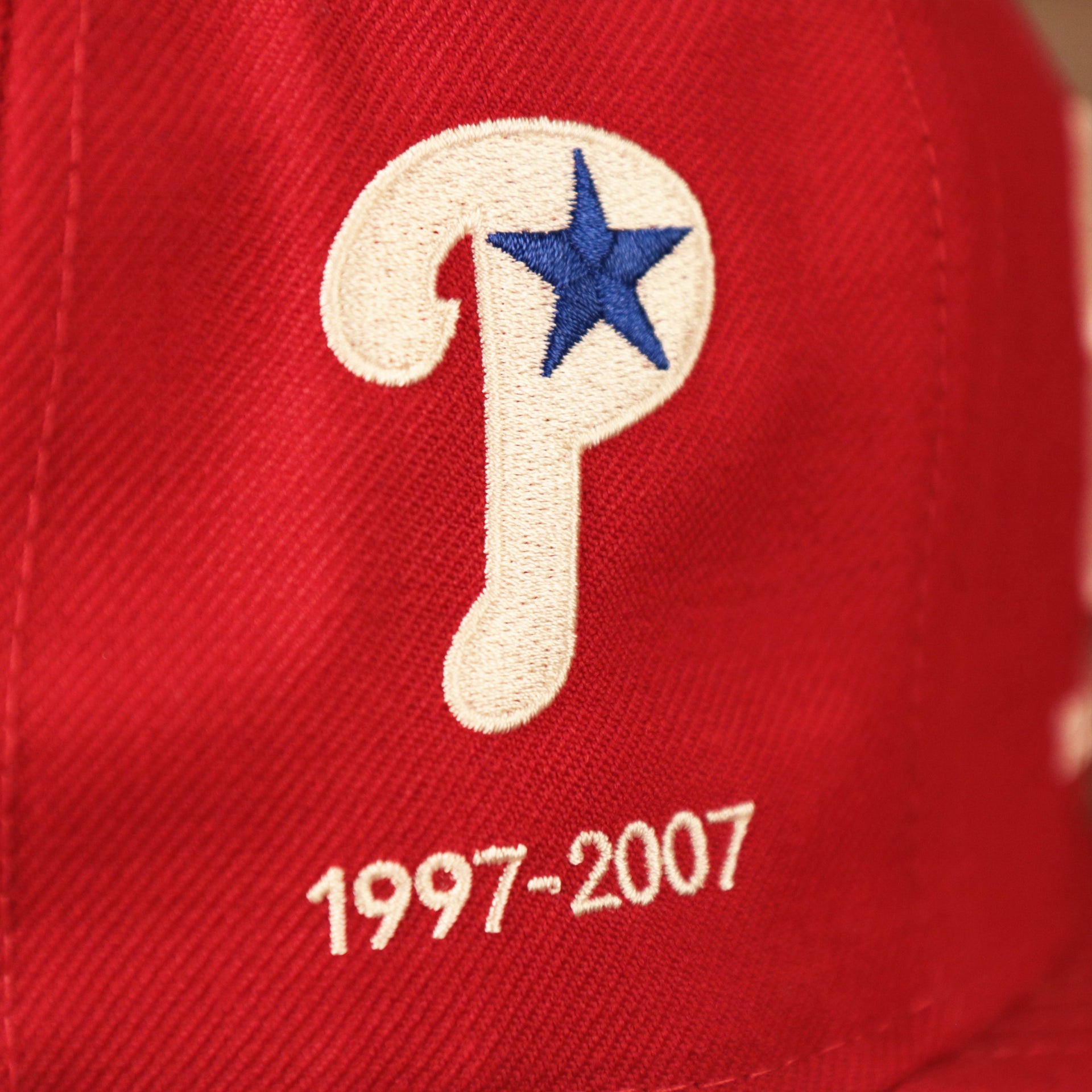 The 1997 funky logo of the Phillies on the red 59fifty by New Era.