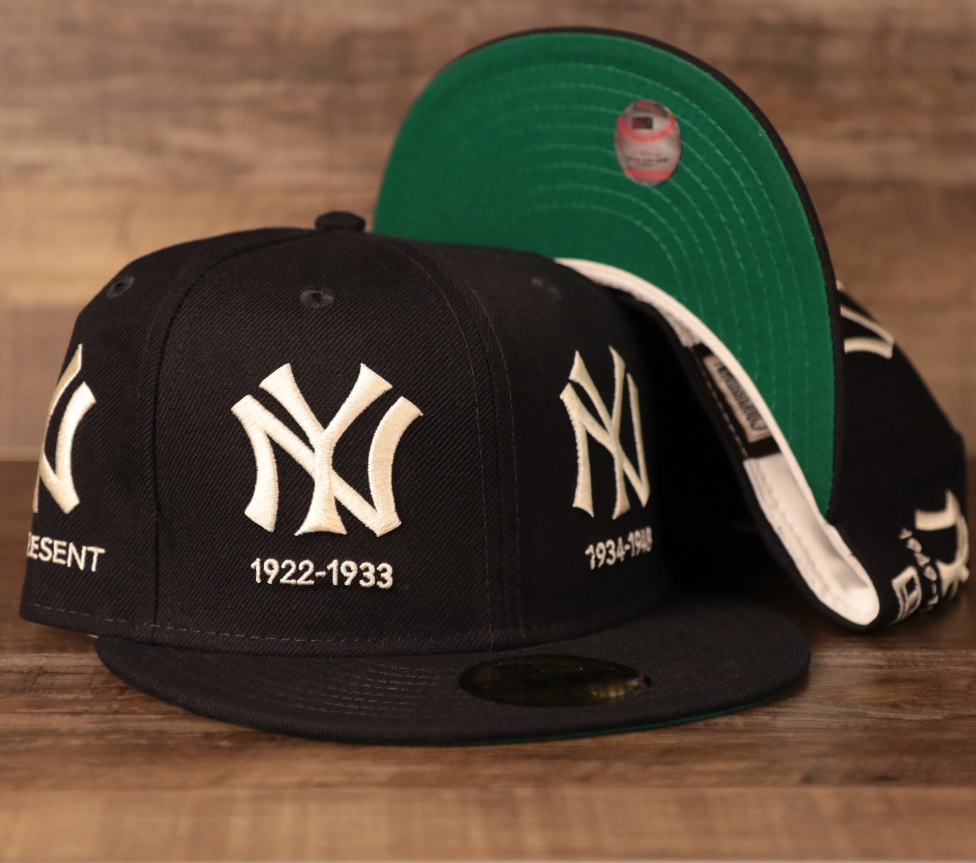A Yankees all-over patch fitted hat with the Yankees logo history by New Era.