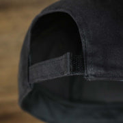 The adjustable strap on the Infant Philadelphia Flyers Black Dad Hat | 47 Brand OSFM