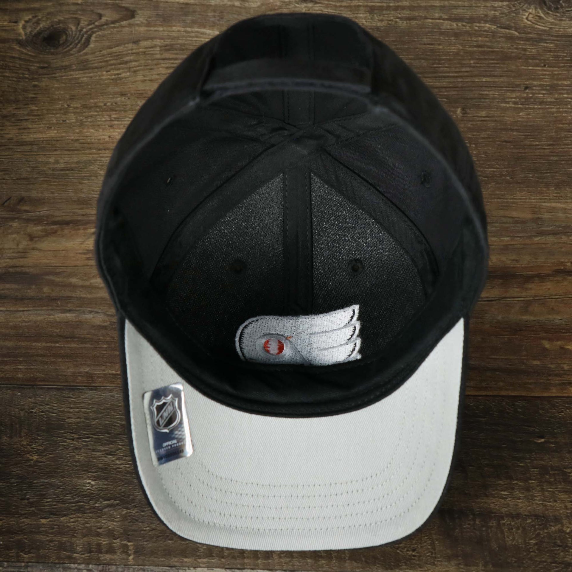 The underside of the Infant Philadelphia Flyers Black Dad Hat | 47 Brand OSFM