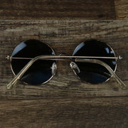 The Youth Round Frame Blue Lens Sunglasses with Rose Gold Frame folded up