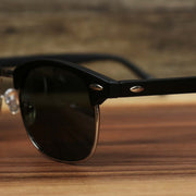 The hinge on the Round Frame Black Lens Sunglasses with Black Silver Frame