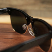 The inside of the Thick Top and Metal Bottom Frame Black Gradient Lens Sunglasses with Black Frame