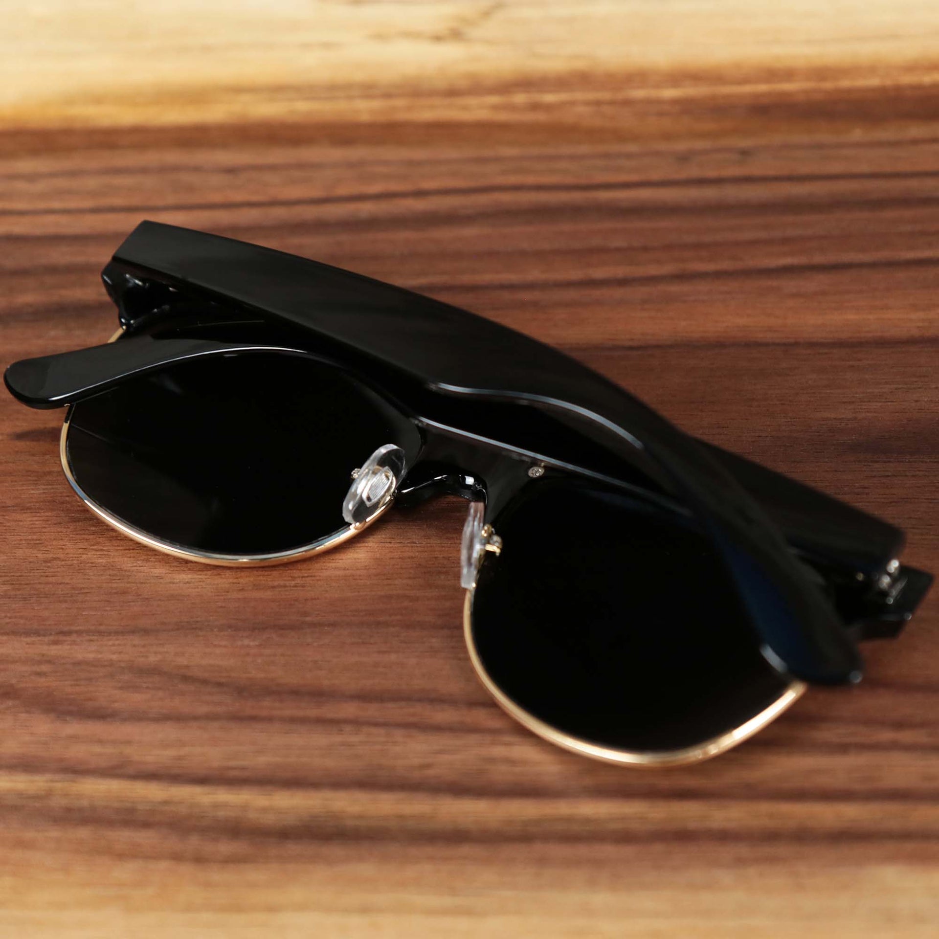 The Thick Top and Metal Bottom Frame Black Gradient Lens Sunglasses with Black Frame folded up