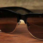 The bridge on the Thick Top and Metal Bottom Frame Brown Lens Sunglasses with Black Frame