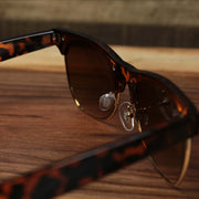 The inside of the Thick Top and Metal Bottom Frame Brown Lens Sunglasses with Tortoise Frame