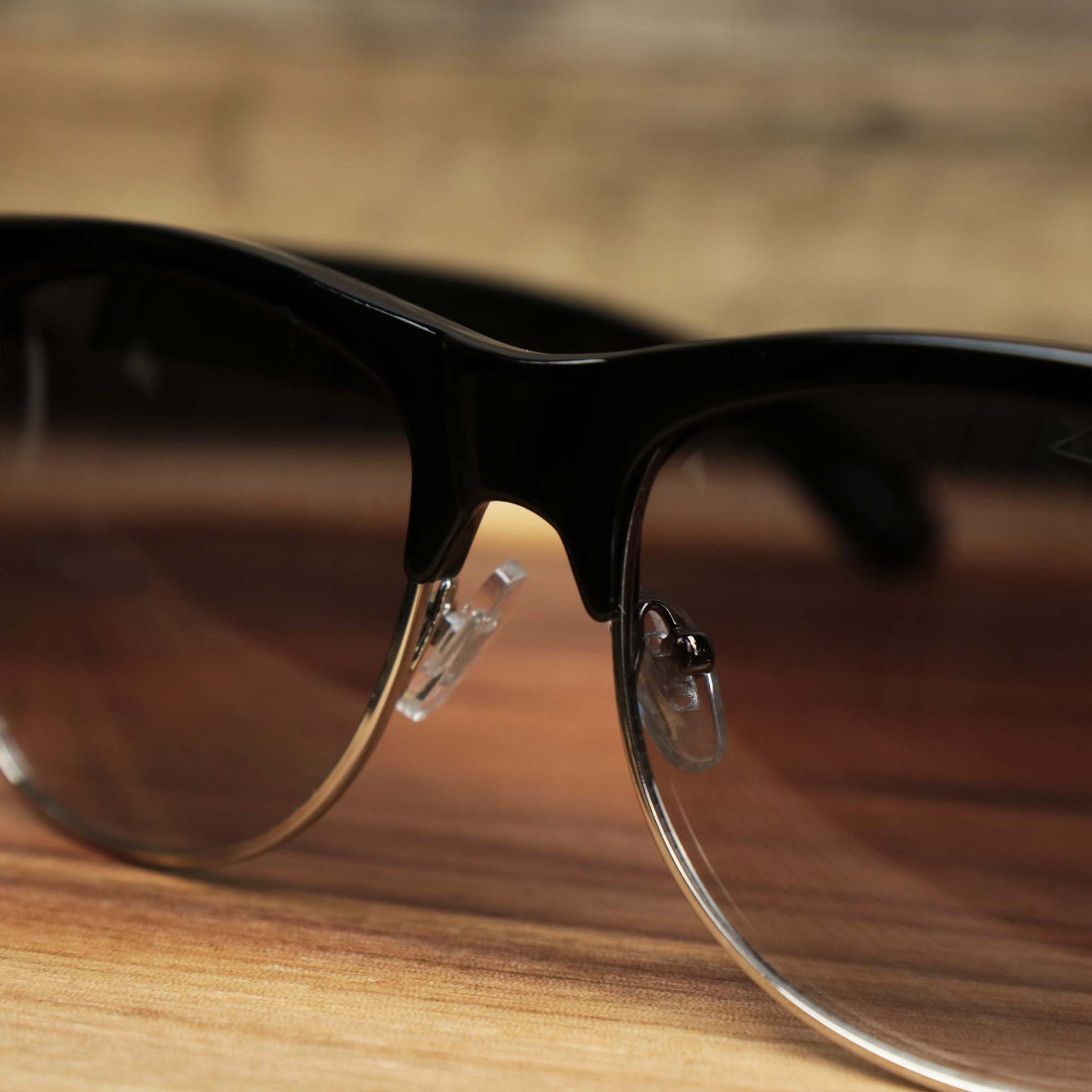 The bridge on the Thick Top and Metal Bottom Frame Black Lens Sunglasses with Black Frame
