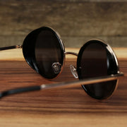 The back of the Circle Frame Black Lens Sunglasses with Gold Frame