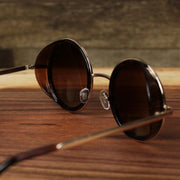 The back of the Circle Frame Brown Lens Sunglasses with Tortoise Frame