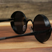The inside of the Round Frame Arched Bridge Black Lens Sunglasses with Black Frame