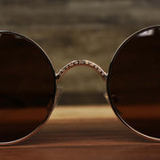 The bridge on the Round Frame Arched Bridge Brown Lens Sunglasses with Gold Frame