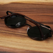 The Round Frame Arched Bridge Black Lens Sunglasses with Brown Frame folded up