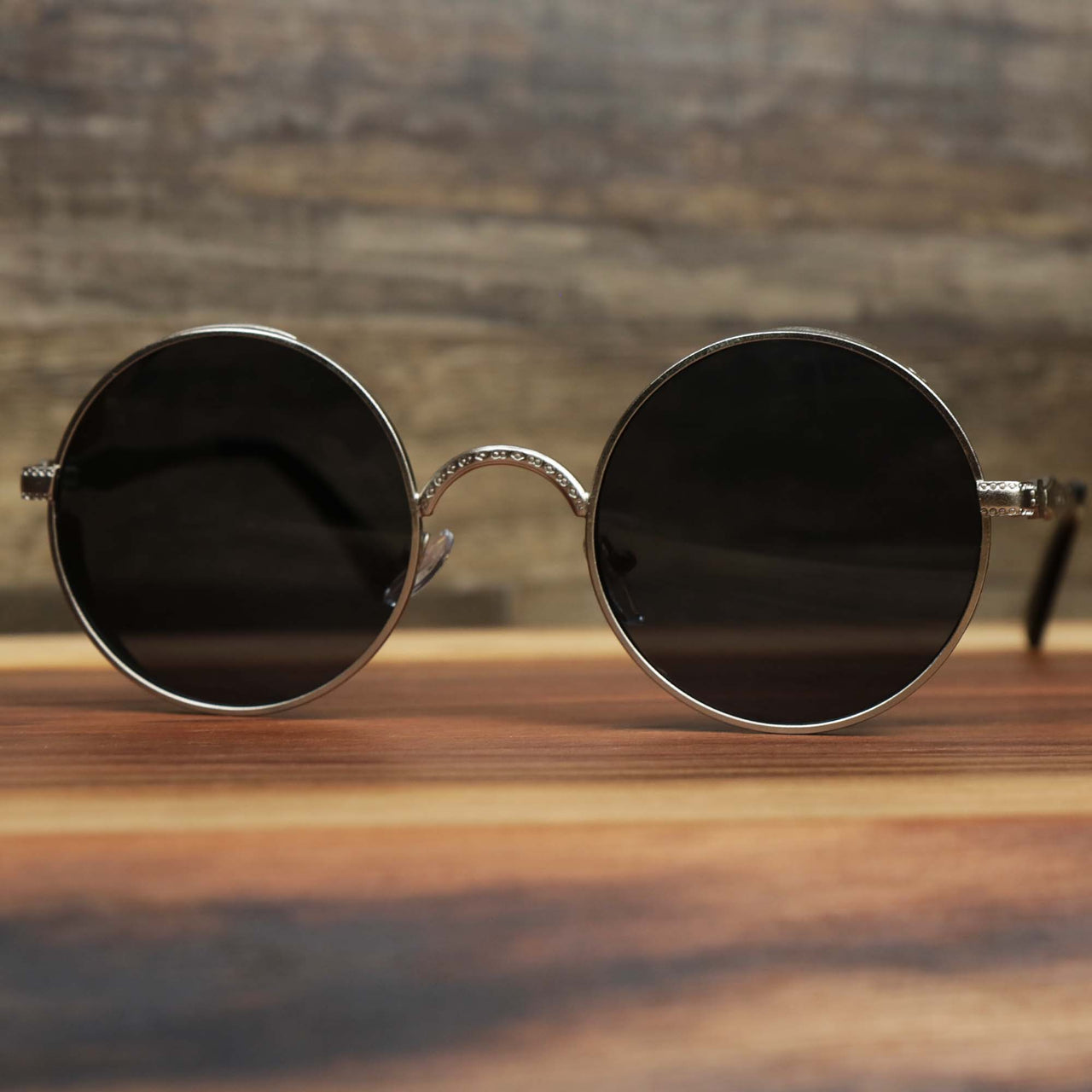 The Round Frame Arched Bridge Black Lens Sunglasses with Silver Frame