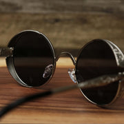 The inside of the Round Frame Arched Bridge Black Lens Sunglasses with Silver Frame