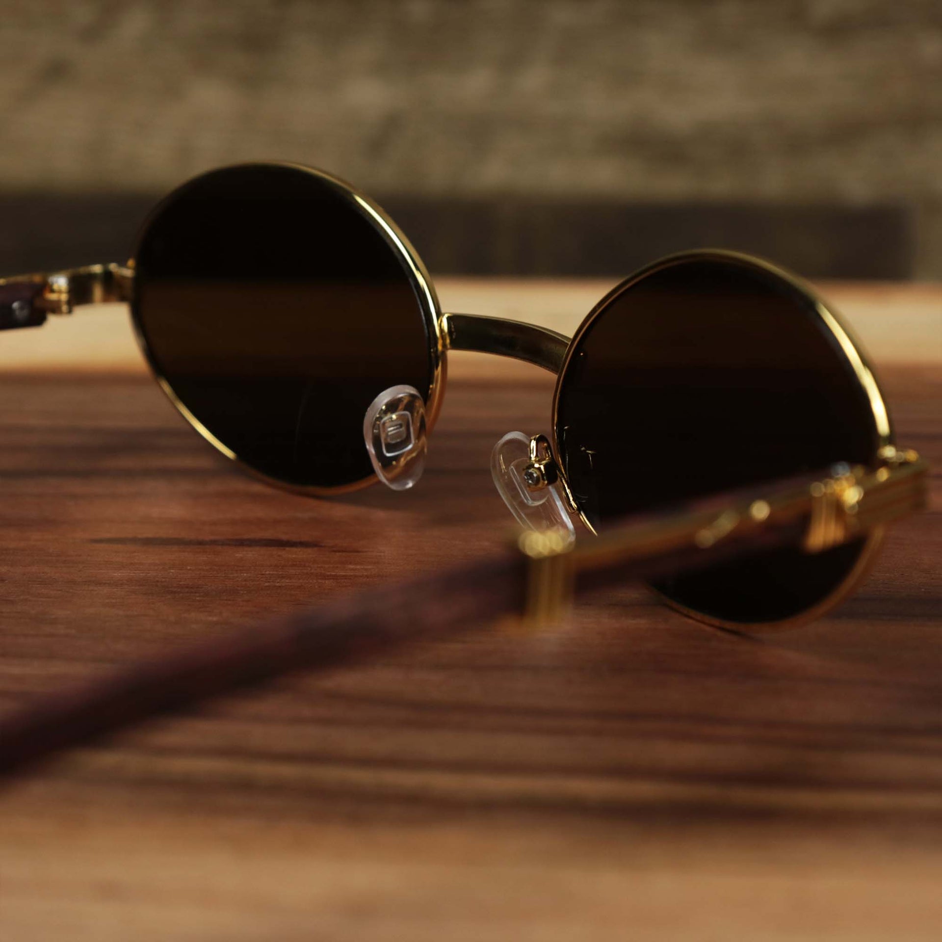 The inside of the Oval 3 Row Frame Brown Lens Sunglasses with Gold Frame