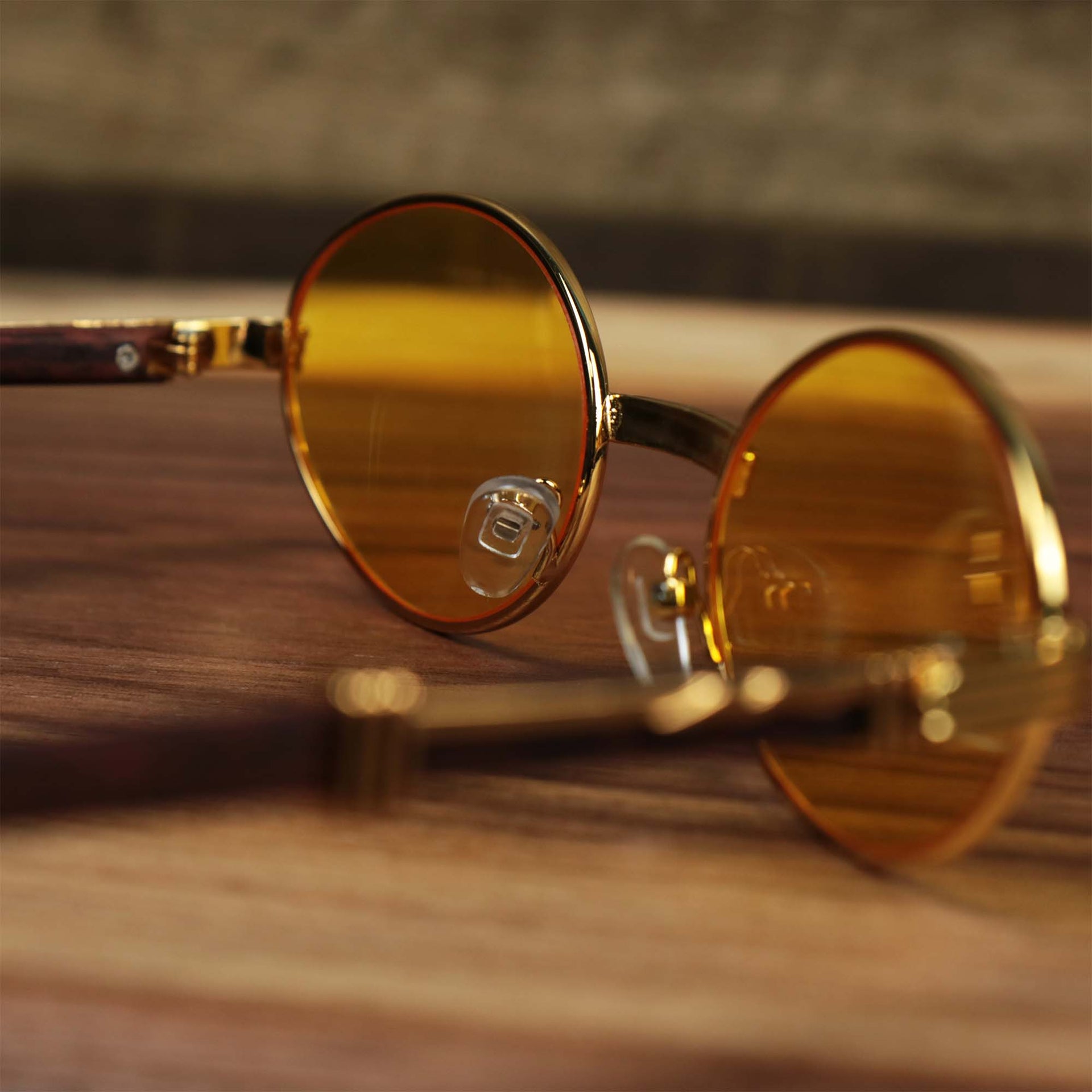 The inside of the Oval 3 Row Frame Yellow Lens Sunglasses with Gold Frame