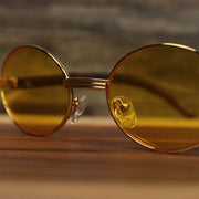 The bridge on the Oval 3 Row Frame Yellow Lens Sunglasses with Gold Frame