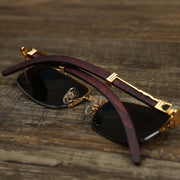 The Rectangle 3 Row Frame Dark Brown Lens Sunglasses with Gold Frame folded up