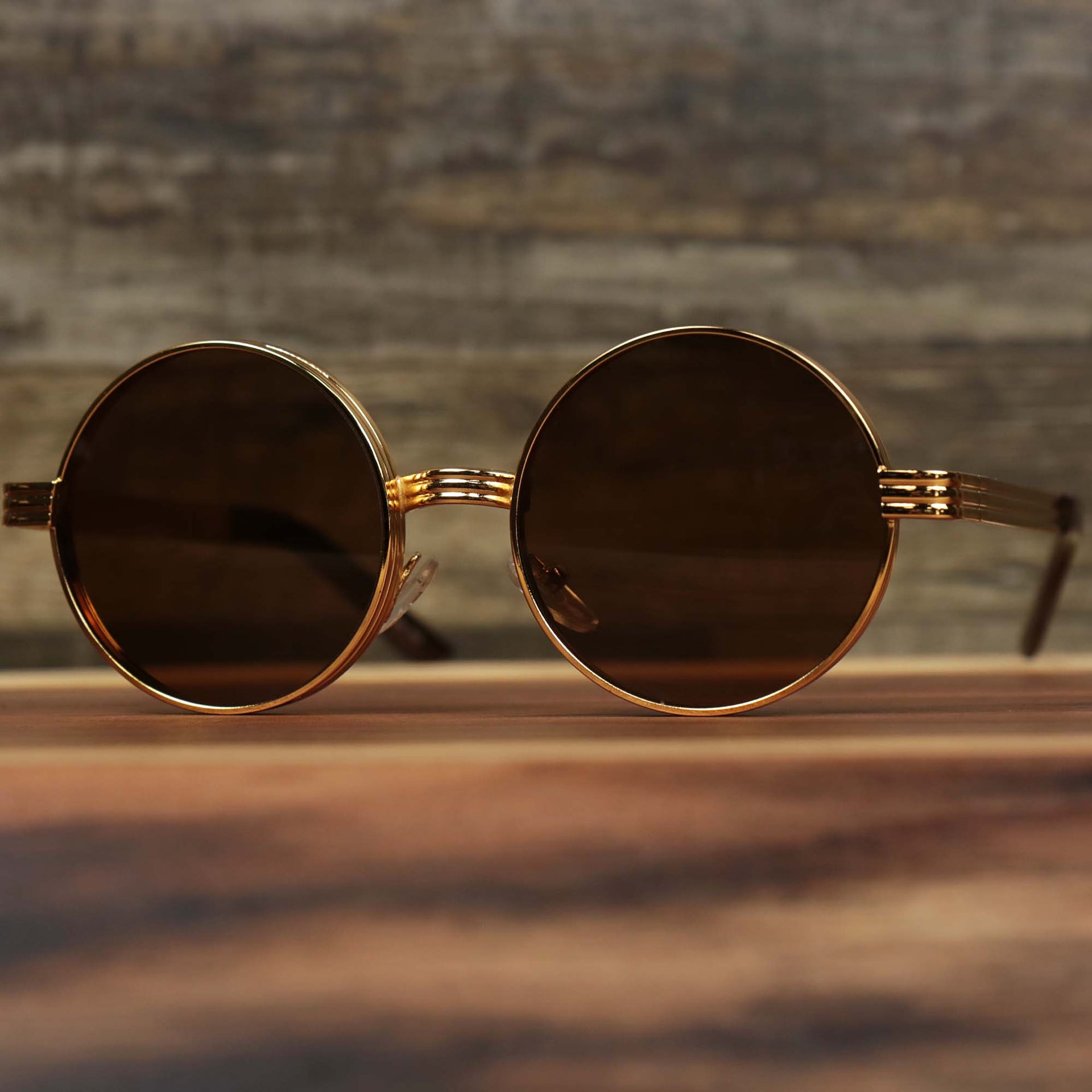 The Round 3 Row Frame Brown Lens Sunglasses with Gold Frame