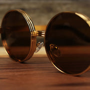 The bridge on the Round 3 Row Frame Brown Lens Sunglasses with Gold Frame