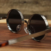 The inside of the Round 3 Row Frame Black Lens Sunglasses with Silver Frame