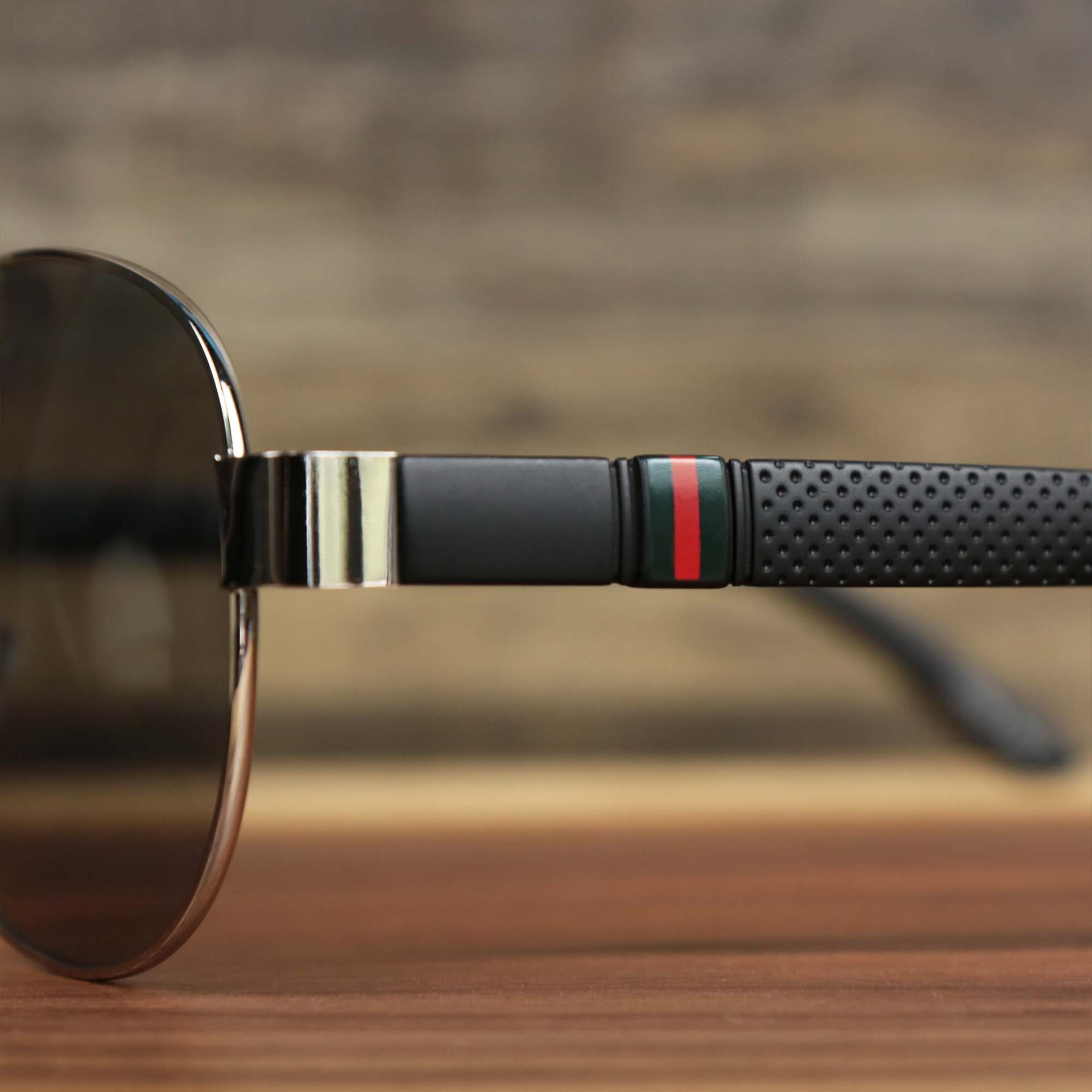 The racing stripe on the Aviator Frame Racing Stripes Black Lens Sunglasses with Silver Frame