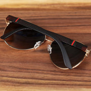 The Aviator Frame Racing Stripes Brown Lens Sunglasses with Rose Gold Frame folded up
