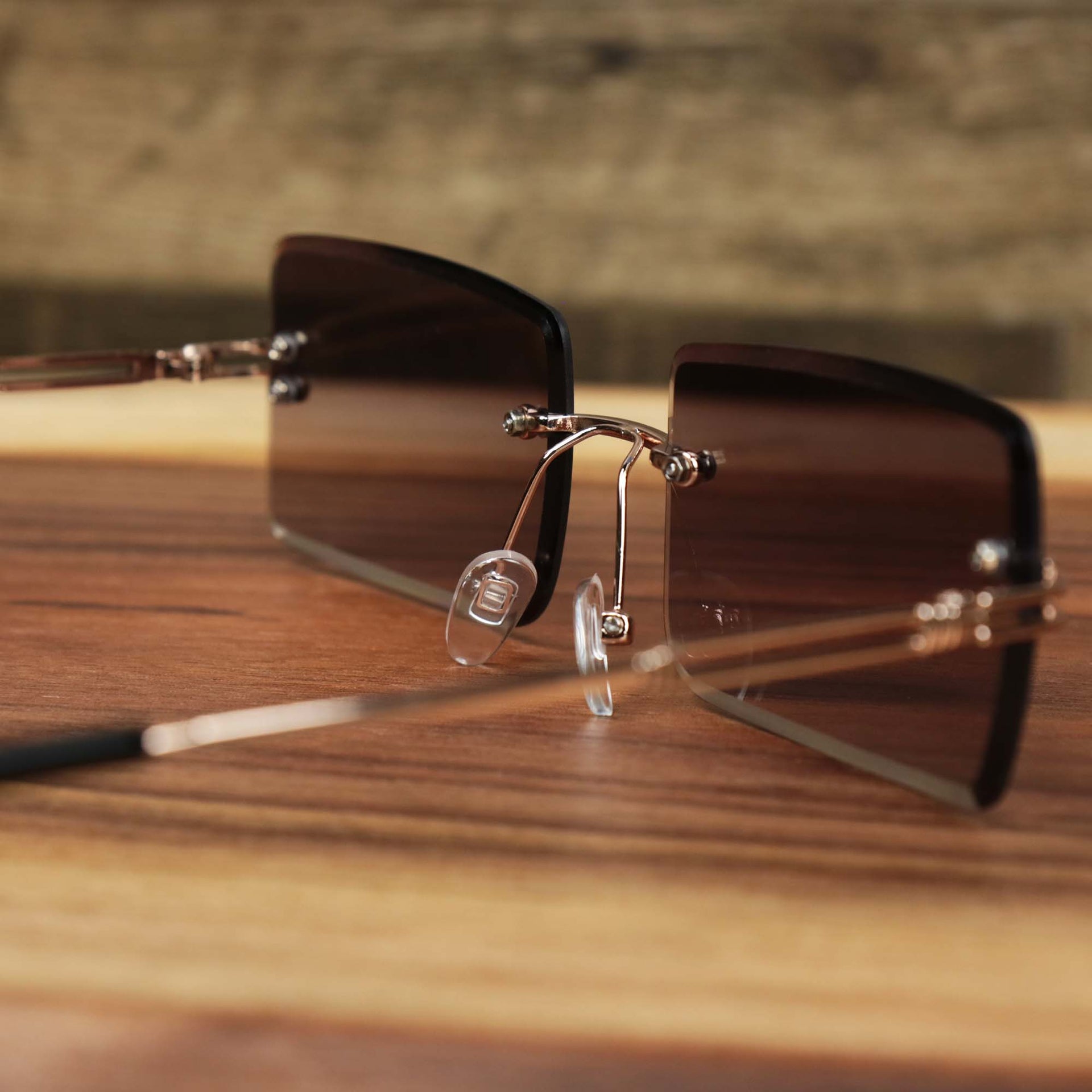 The inside of the Rectangle Frame Black Lens Sunglasses with Gold Frame