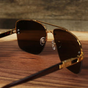The inside of the Round Rectangle Frame Brown Lens Sunglasses with Gold Frame