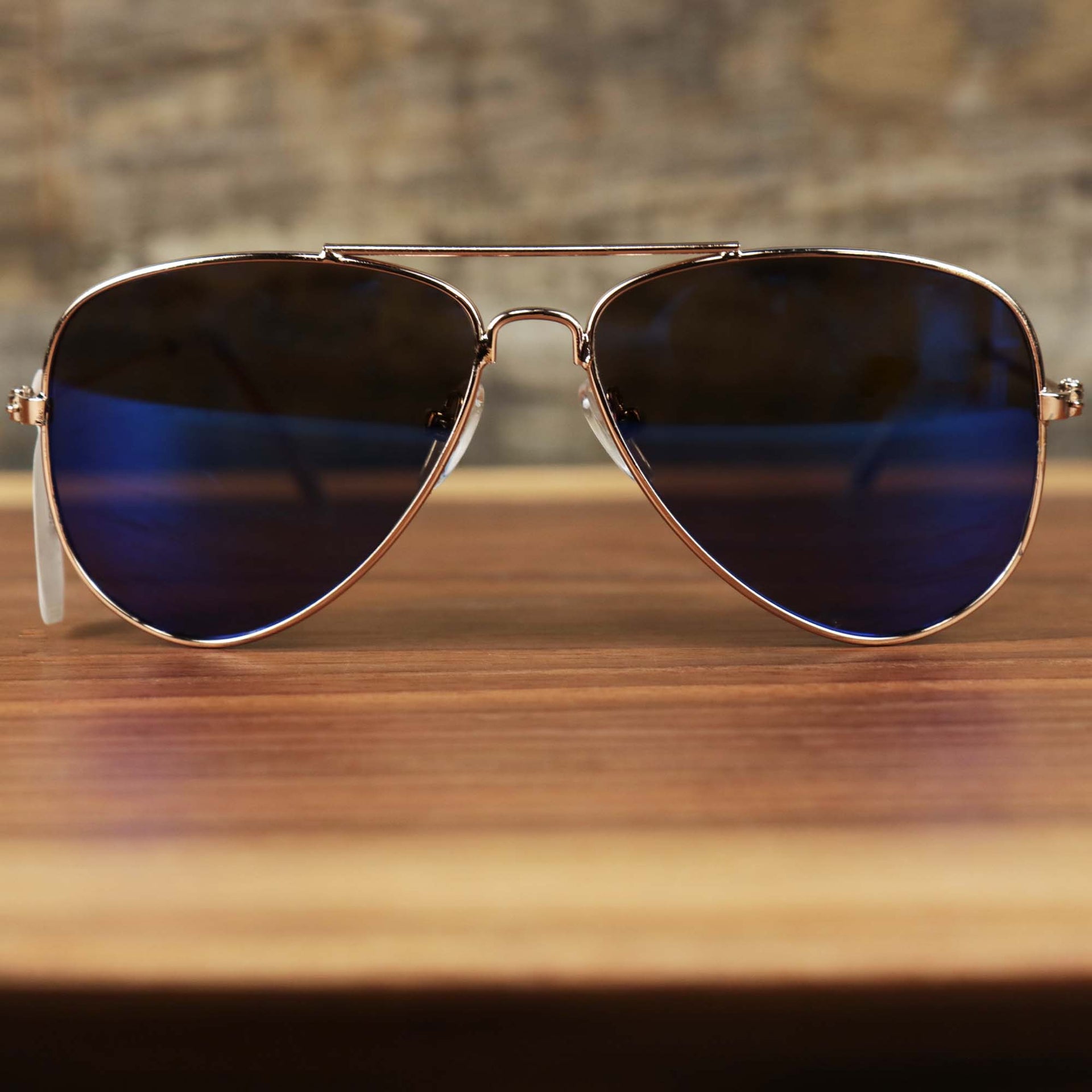 The Kid’s Aviator Frame Blue Lens Sunglasses with Rose Gold Frame