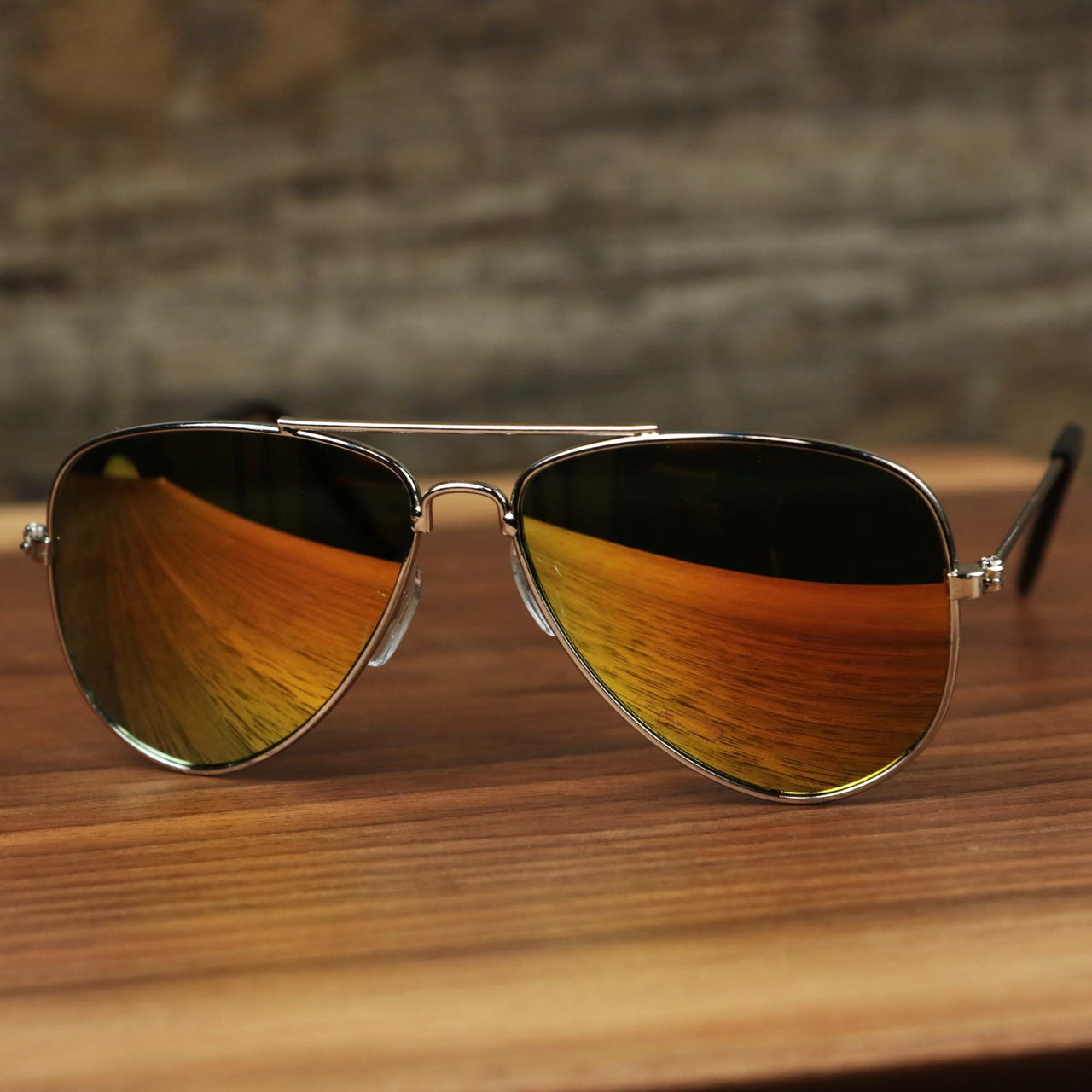 The Kid’s Aviator Frame Orange Lens Sunglasses with Silver Frame