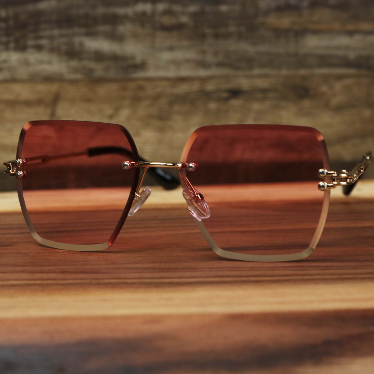 The Large Lightweight Frame Pink Lens Sunglasses with Rose Gold Frame