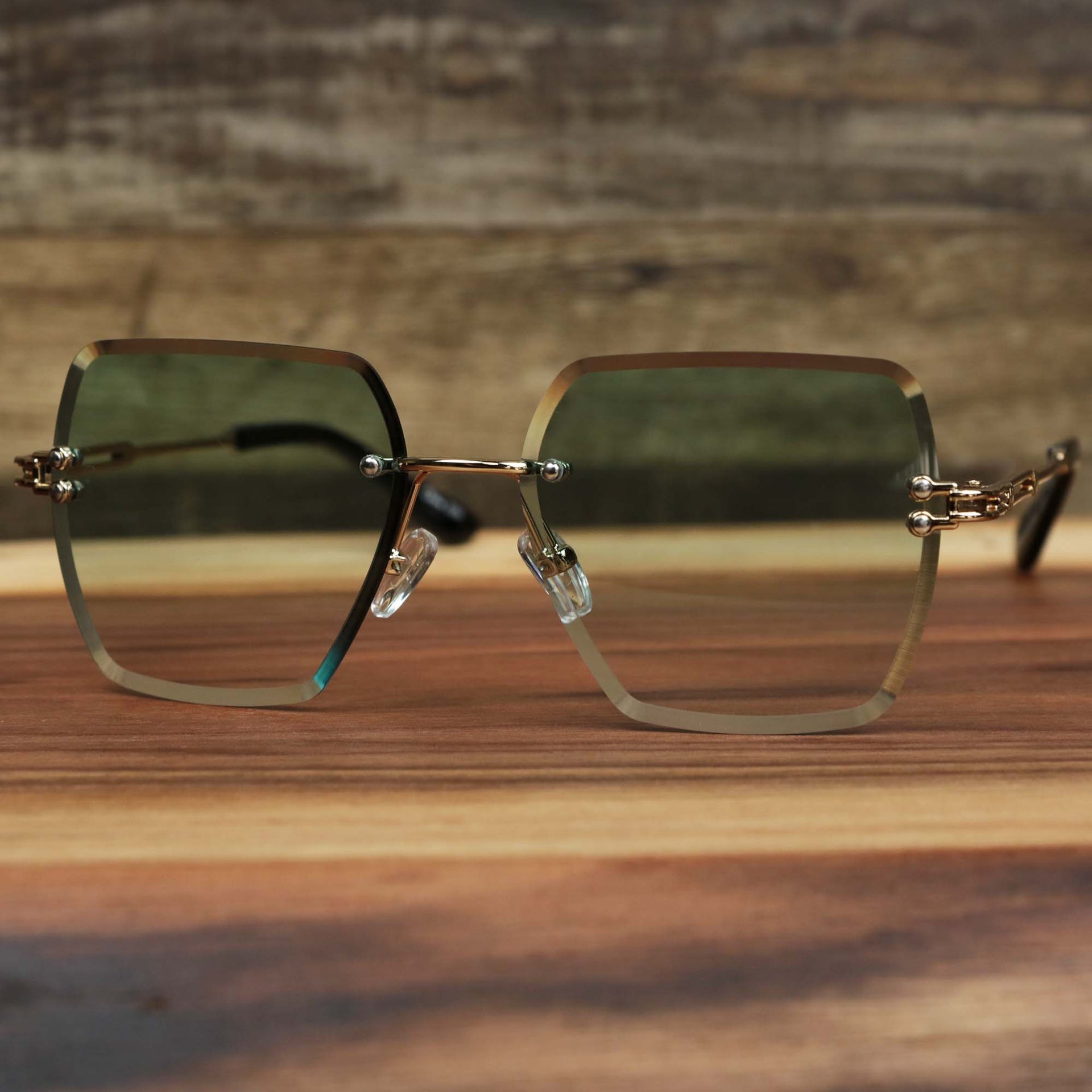 The Large Lightweight Frame Green Lens Sunglasses with Gold Frame