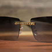 The bridge on the Rectangle Frames Black Lens Flooded Sunglasses with Gold Frame