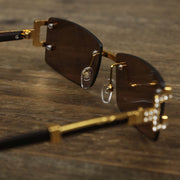 The inside of the Rectangle Frames Brown Lens Flooded Sunglasses with Gold Frame