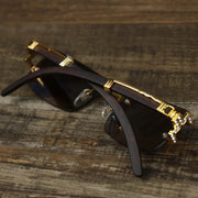 The Rectangle Frames Brown Lens Flooded Sunglasses with Gold Frame folded up