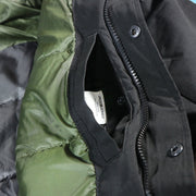 The hidden pocket on the Meeko Fur Hood Recycled Polyester Linner Bomber Jacket | Black Bomber Jacket