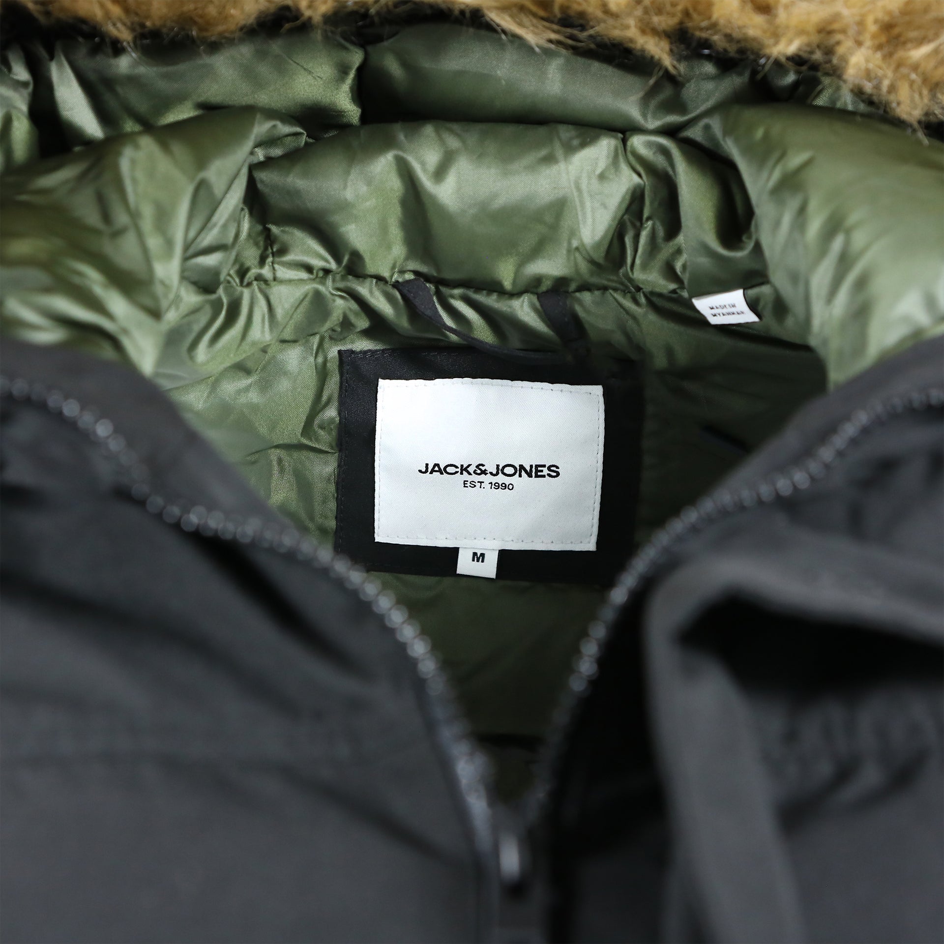 The Jack And Jones Tag on the Meeko Fur Hood Recycled Polyester Linner Bomber Jacket | Black Bomber Jacket