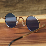The inside of the Round Frames Blue Lens Sunglasses with Gold Frame