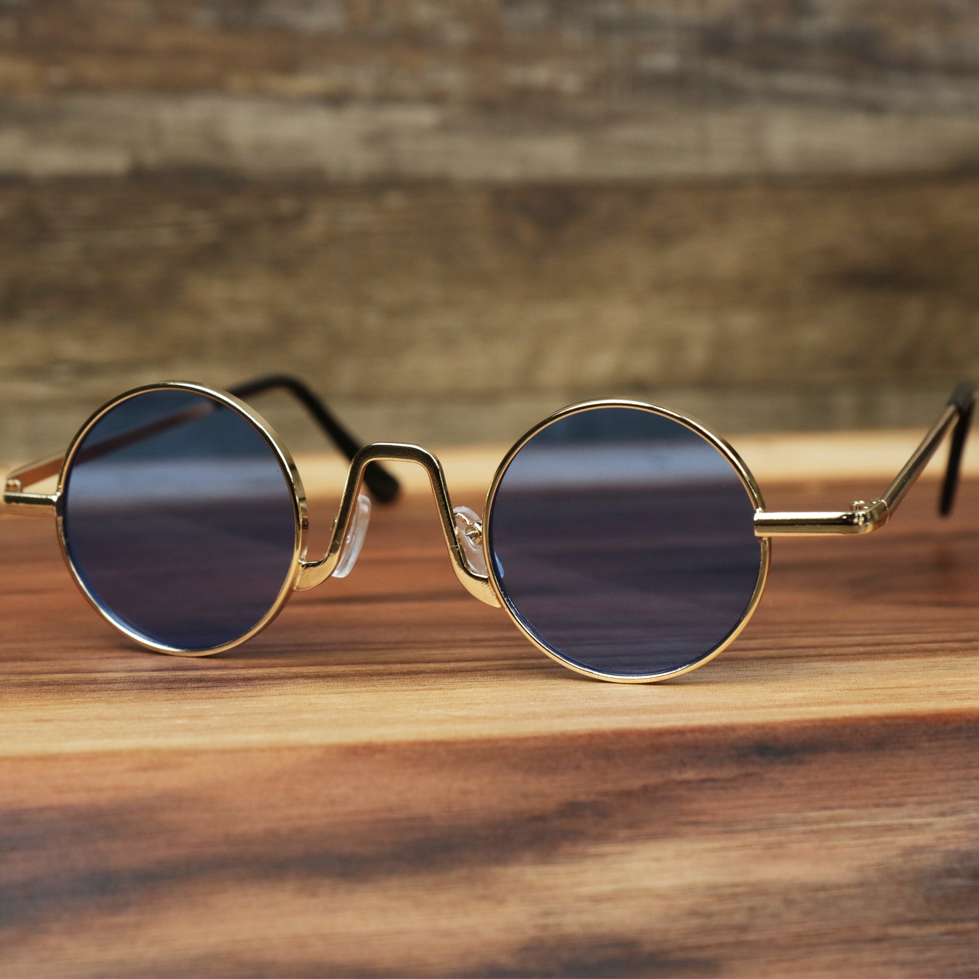 The Round Frames Blue Lens Sunglasses with Gold Frame