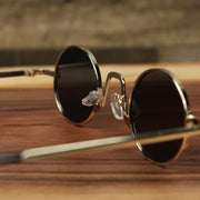 The inside of the Round Frames Black Lens Sunglasses with Gold Frame