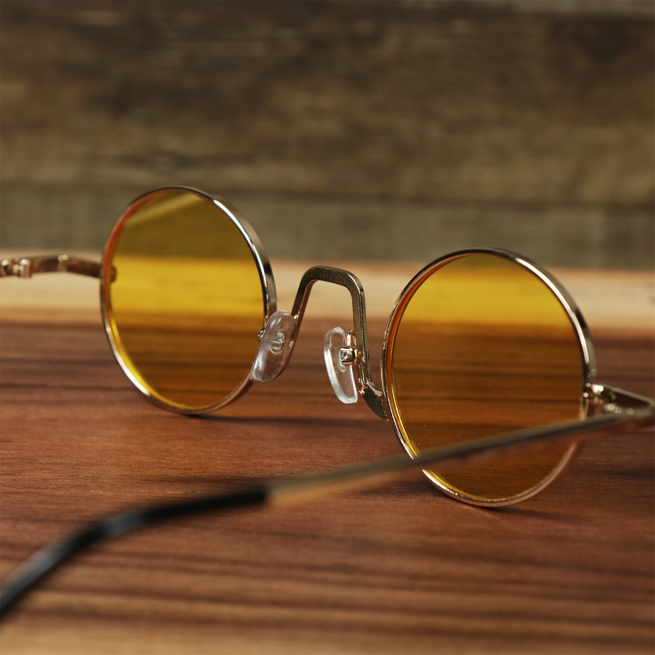 The inside of the Round Frames Yellow Lens Sunglasses with Gold Frame