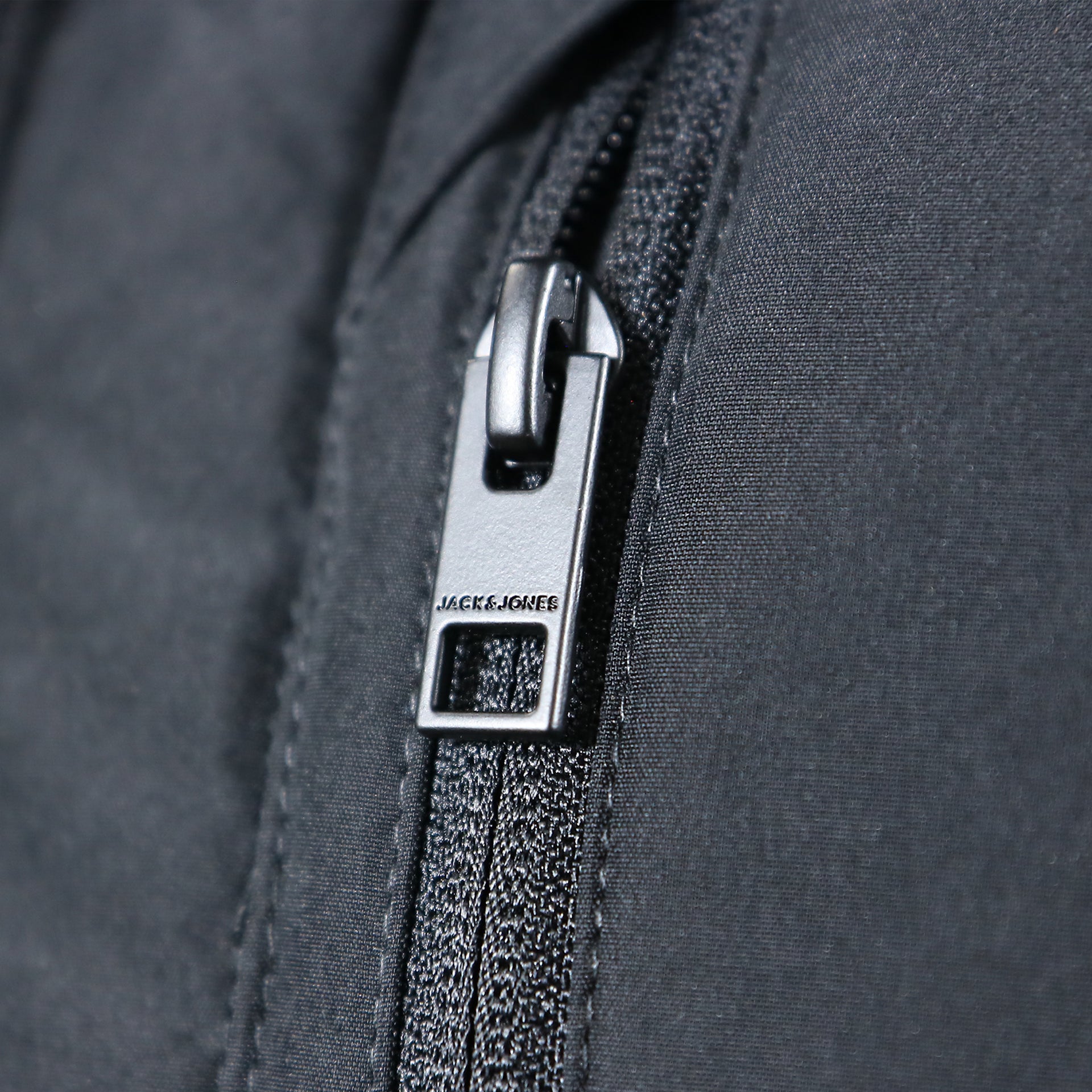 The Zipper on the Jack And Jones Jet Black Puffer Jacket With Hidden Pocket | Black Puffer Jacket
