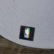 The NBA Jerry West Sticker on the Utah Jazz NBA 2022 Draft Gray Bottom 9Fifty Snapback | New Era Cream/Black