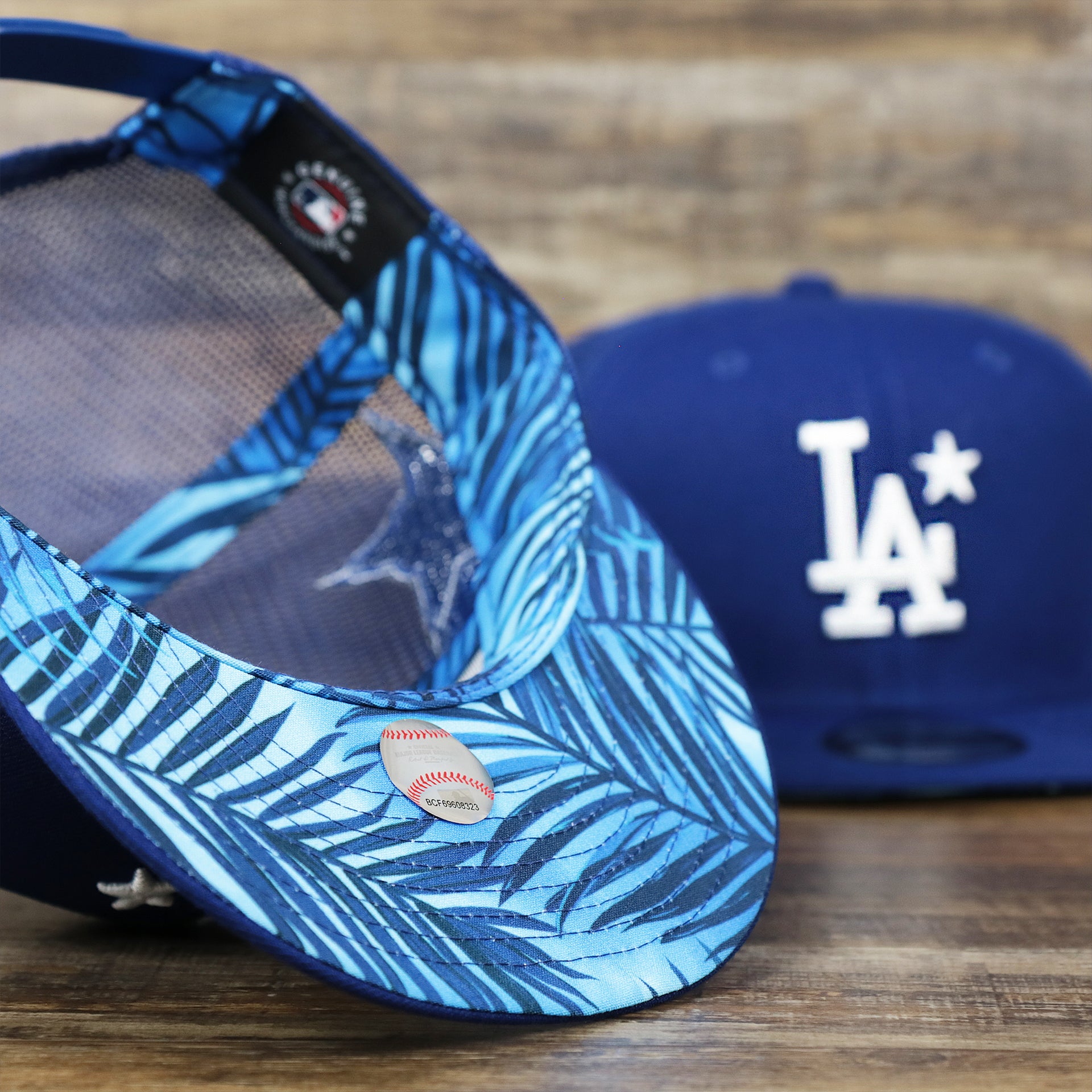 The Undervisor on the Los Angeles Dodgers Metallic All Star Game MLB 2022 Side Patch 9Fifty Mesh Snapback | ASG 2022 Royal Blue Trucker Hat